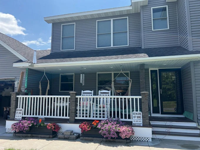 Completed residential roof and siding replacement